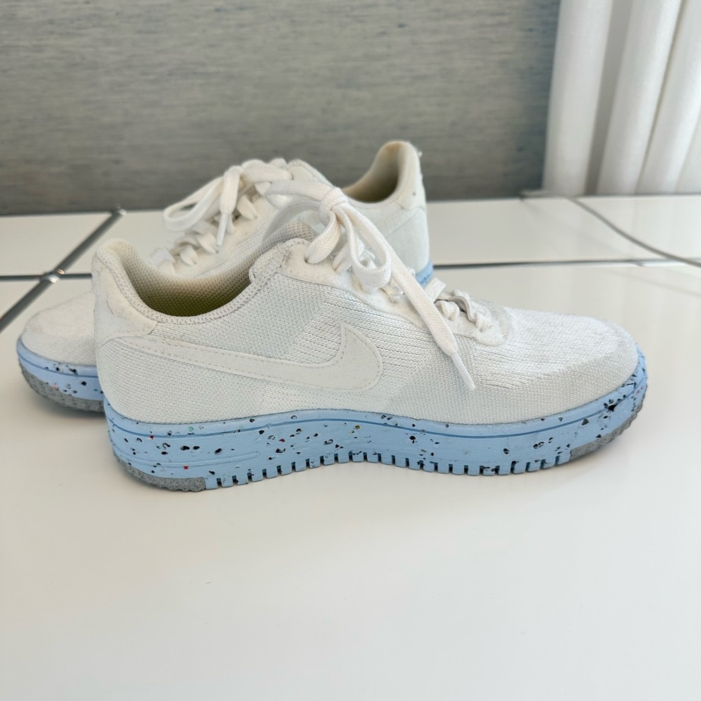 Nike White Sneakers with Blue Speckled Sole